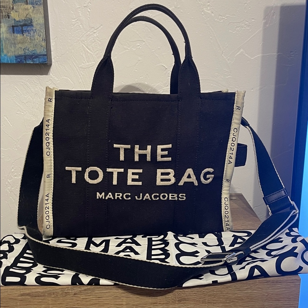 Marc Jacobs Black and Cream Tote Bag includes dust cover bag